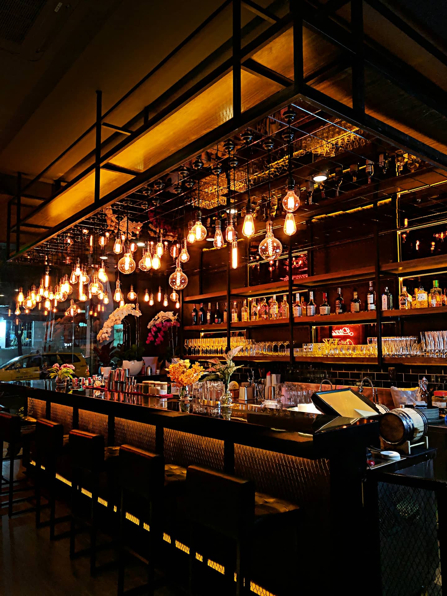 The bar, lit in the evening
